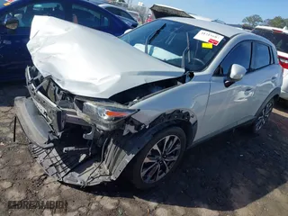 2019 Mazda CX-3 Touring with VIN JM1DKDC70K1406403, listed as a IAAI auction lot 41719684 with 119,602 mi miles. Bid and sale history available at carsss.com. Image 18.