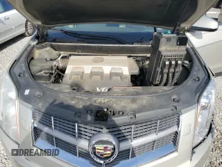 2010 Cadillac SRX Premium Collection с VIN 3GYFNCEY5AS630466, выставлен на аукционе Copart как лот 51288365 с пробегом 72 390 миль миль и Списание • Salvage title. История ставок и продаж доступна на DreamBid. Изображение 13.