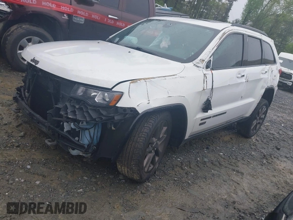 2016 Jeep Grand Cherokee Limited 75th Anniversary with VIN 1C4RJFBG0GC441492, listed as a IAAI auction lot 41974876 with 136,525 mi miles and . Bid and sale history available at DreamBid. Image 2.