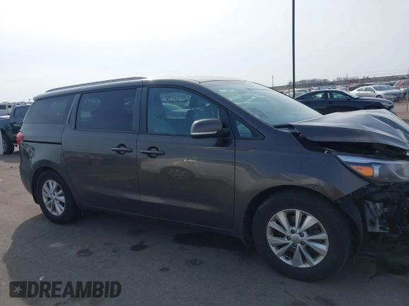 2017 Kia Sedona LX with VIN KNDMB5C19H6329933, listed as a IAAI auction lot 41796158 with 101,399 mi miles. Bid and sale history available at carsss.com. Image 14.