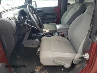 2007 Jeep Wrangler Sahara с VIN 1J4FA54137L205242, выставлен на аукционе Copart как лот 65080025 с пробегом 128 682 миль миль и Списание • Salvage title. История ставок и продаж доступна на DreamBid. Изображение 7.