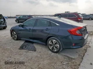 2016 Honda Civic EX-T z VIN 19XFC1F37GE012186, wystawiony jako Copart lot #51590575 z przebiegiem 121 041 mil mil oraz Szkoda całkowita • Salvage title. Historia ofert i sprzedaży dostępna na DreamBid. Obrazek 2.