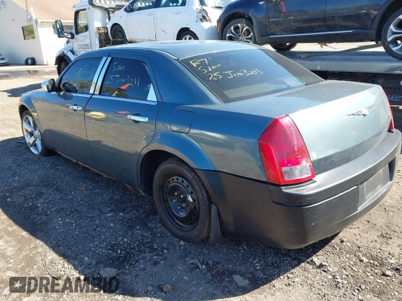 2005 Chrysler 300 with VIN 2C3JA53GX5H188833, listed as a IAAI auction lot 41906889 with 999,999 mi miles. Bid and sale history available at carsss.com. Image 3.