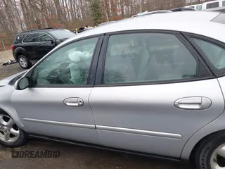 2003 Ford Taurus SE Standard with VIN 1FAFP53273G132268, listed as a IAAI auction lot 41790335 with 202,724 mi miles. Bid and sale history available at carsss.com. Image 14.