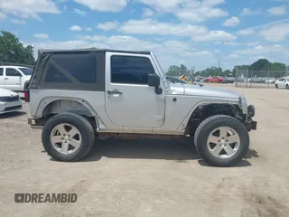 2009 Jeep Wrangler X with VIN 1J4FA24189L755392, listed as a IAAI auction lot 42176130 with 97,644 mi miles and . Bid and sale history available at DreamBid. Image 12.