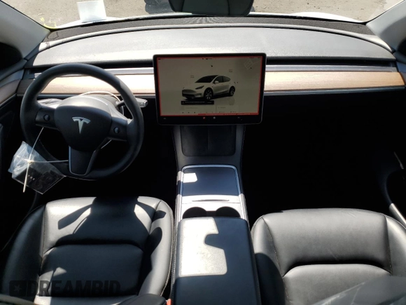2022 Tesla Model Y Long Range with VIN 7SAYGAEE4NF534588, listed as a Copart auction lot 53274995 with 20,768 mi miles and Salvage Title. Bid and sale history available at DreamBid. Image 8.