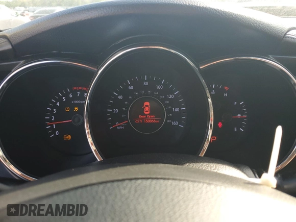 2013 Kia Optima EX with VIN 5XXGN4A79DG140944, listed as a Copart auction lot 52099915 with 150,866 mi miles and Salvage Title. Bid and sale history available at carsss.com. Image 9.