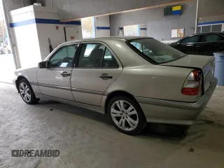 1999 Mercedes-Benz C 230/260/280/320 with VIN WDBHA24G7XA740618, listed as a Copart auction lot 78695104 with 144,512 mi miles and Salvage Title. Bid and sale history available at carsss.com. Image 2.