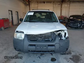 2003 Ford Escape XLS Popular with VIN 1FMYU02123KD48951, listed as a IAAI auction lot 41765772 with 208,796 mi miles. Bid and sale history available at carsss.com. Image 12.