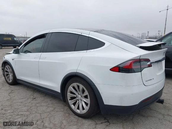 2016 Tesla Model X 70D with VIN 5YJXCBE2XGF013295, listed as a IAAI auction lot 41862736 with 96,190 mi miles. Bid and sale history available at carsss.com. Image 3.