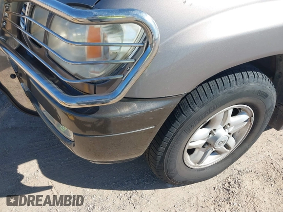 2000 Lexus LX 470 with VIN JT6HT00WXY0079873, listed as a IAAI auction lot 41605770 with 302,758 mi miles and . Bid and sale history available at DreamBid. Image 6.