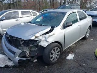 2009 Toyota Corolla with VIN JTDBL40E899083155, listed as a IAAI auction lot 41056942 with 294,132 mi miles. Bid and sale history available at carsss.com. Image 17.