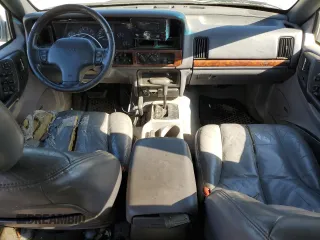 1997 Jeep Grand Cherokee Limited with VIN 1J4GZ78Y5VC598822, listed as a Copart auction lot 74306474 with 276,454 mi miles and Salvage Title. Bid and sale history available at carsss.com. Image 8.