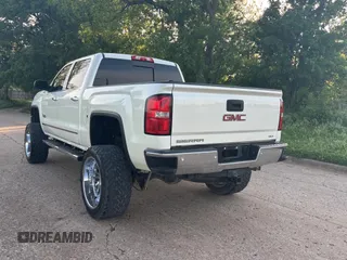 2015 GMC Sierra 1500 SLT with VIN 3GTU2VEC0FG239547, listed as a Copart auction lot 54957305 with 135,497 mi miles and Clean Title. Bid and sale history available at DreamBid. Image 3.