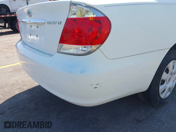 2006 Toyota Camry STD with VIN 4T1BE32KX6U734944, listed as a IAAI auction lot 42006245 with 243,967 mi miles. Bid and sale history available at carsss.com. Image 14.