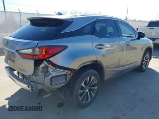2020 Lexus RX with VIN 2T2AZMAA7LC173478, listed as a IAAI auction lot 41671494 with 91,777 mi miles. Bid and sale history available at carsss.com. Image 4.