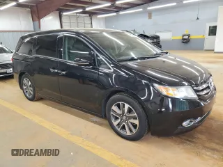 2015 Honda Odyssey Touring Elite with VIN 5FNRL5H99FB005576, listed as a Copart auction lot 58963215 with 167,967 mi miles and Salvage title. Bid and sale history available at DreamBid. Image 4.