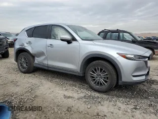 2021 Mazda CX-5 Touring with VIN JM3KFACM9M0409414, listed as a Copart auction lot 89071495 with 43,896 mi miles and Salvage Title. Bid and sale history available at carsss.com. Image 4.