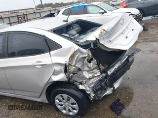 2017 Hyundai Accent SE with VIN KMHCT4AE3HU310052, listed as a IAAI auction lot 41546087 with 129,732 mi miles. Bid and sale history available at carsss.com. Image 6.