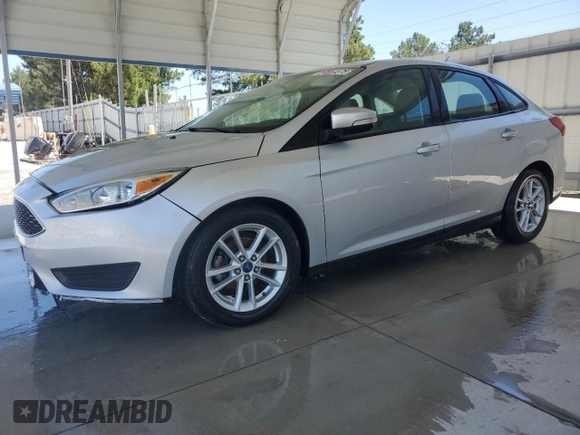 2016 Ford Focus SE with VIN 1FADP3F27GL336945, listed as a Copart auction lot 57811575 with 134,015 mi miles and Salvage title. Bid and sale history available at DreamBid. Image 1.