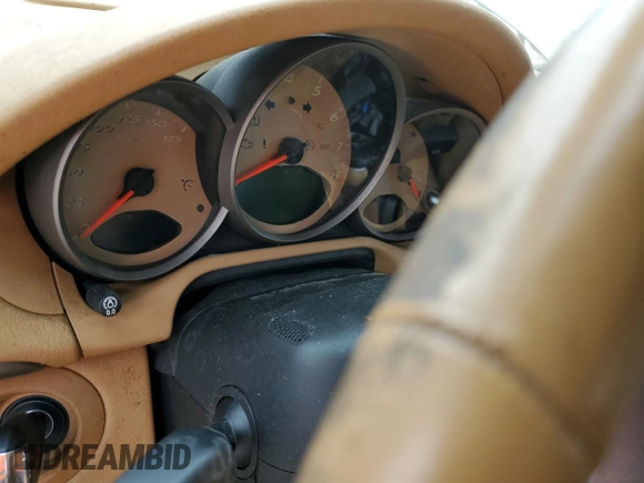 2005 Porsche Boxster с VIN WP0CA29875U713041, выставлен на аукционе Copart как лот 74948004 с пробегом Не указан миль и Списание • Salvage title. История ставок и продаж доступна на DreamBid. Изображение 9.