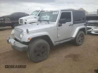 2010 Jeep Wrangler Sahara z VIN 1J4GA5D18AL182858, wystawiony jako Copart lot #57601695 z przebiegiem Nie podano mil oraz Czysty tytuł • Clean title. Historia ofert i sprzedaży dostępna na DreamBid. Obrazek 1.
