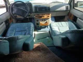1995 GMC Safari z VIN 1GDDM19W2SB525888, wystawiony jako Copart lot #81358954 z przebiegiem 121 066 mil mil oraz Szkody całkowita. Historia ofert i sprzedaży dostępna na DreamBid. Obrazek 8.