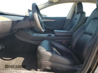 2023 Tesla Model 3 with VIN 5YJ3E1EA1PF456896, listed as a Copart auction lot 50423785 with 49,316 mi miles and Salvage title. Bid and sale history available at DreamBid. Image 7.