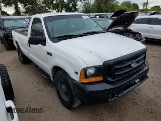 2000 Ford Super Duty F-250 XL with VIN 1FTNF20L8YEA71116, listed as a Copart auction lot 73739324 with 303,338 mi miles and Salvage Title. Bid and sale history available at carsss.com. Image 4.