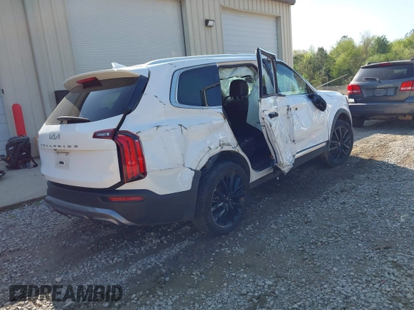 2022 Kia Telluride SX with VIN 5XYP54HC1NG290854, listed as a IAAI auction lot 41966799 with 47,218 mi miles and . Bid and sale history available at DreamBid. Image 4.