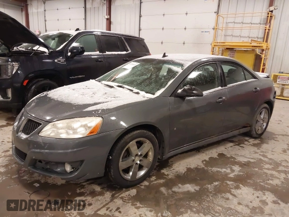2009 Pontiac G6 1SB z VIN 1G2ZJ57KX94267343, wystawiony jako IAAI lot #41514632 z przebiegiem 164 061 mil mil oraz . Historia ofert i sprzedaży dostępna na DreamBid. Obrazek 2.
