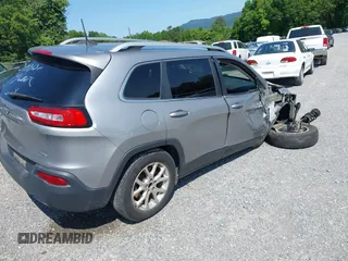 2016 Jeep Cherokee Altitude with VIN 1C4PJMCBXGW183284, listed as a IAAI auction lot 42346167 with 144,493 mi miles and . Bid and sale history available at DreamBid. Image 4.