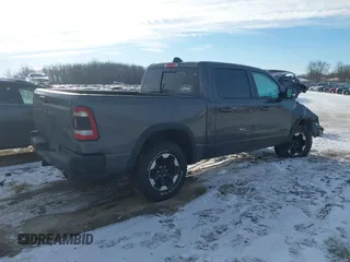 2022 Ram 1500 Rebel z VIN 1C6SRFLT9NN204868, wystawiony jako IAAI lot #41351273 z przebiegiem 67 120 mil mil oraz . Historia ofert i sprzedaży dostępna na DreamBid. Obrazek 4.