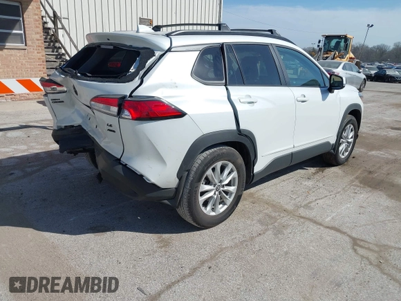 2022 Toyota Corolla Cross LE with VIN 7MUCAABG7NV013235, listed as a IAAI auction lot 41796408 with 20,943 mi miles and . Bid and sale history available at DreamBid. Image 4.