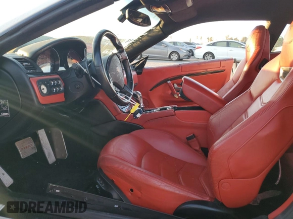 2013 Maserati GranTurismo Sport с VIN ZAM45VLA0D0069194, выставлен на аукционе Copart как лот 84061174 с пробегом 84 549 миль миль и Списание • Salvage title. История ставок и продаж доступна на DreamBid. Изображение 7.
