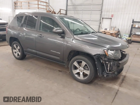 2016 Jeep Compass Latitude z VIN 1C4NJCEA7GD792821, wystawiony jako IAAI lot #42673045 z przebiegiem 112 774 mil mil oraz . Historia ofert i sprzedaży dostępna na DreamBid. Obrazek 1.