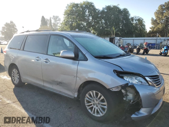 2011 Toyota Sienna XLE AAS with VIN 5TDYK3DC5BS166856, listed as a Copart auction lot 50077455 with 171,649 mi miles and Salvage Title. Bid and sale history available at carsss.com. Image 4.
