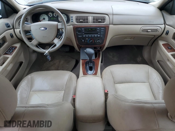 2006 Ford Taurus SEL with VIN 1FAFP56U86A194072, listed as a Copart auction lot 63779615 with 77,377 mi miles and Salvage title. Bid and sale history available at DreamBid. Image 8.