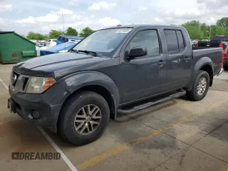 2014 Nissan Frontier SV with VIN 1N6AD0EV9EN755409, listed as a Copart auction lot 56754605 with 289,884 mi miles and Salvage title. Bid and sale history available at DreamBid. Image 1.