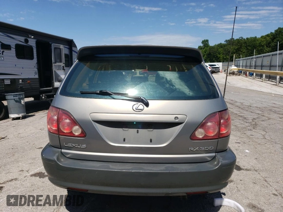 2000 Lexus RX 300 z VIN JT6HF10U5Y0114069, wystawiony jako Copart lot #58276535 z przebiegiem 295 720 mil mil oraz Szkoda całkowita • Salvage title. Historia ofert i sprzedaży dostępna na DreamBid. Obrazek 6.