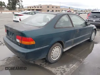 1997 Honda Civic DX with VIN 1HGEJ6128VL023684, listed as a IAAI auction lot 41502999 with 140,871 mi miles. Bid and sale history available at carsss.com. Image 4.