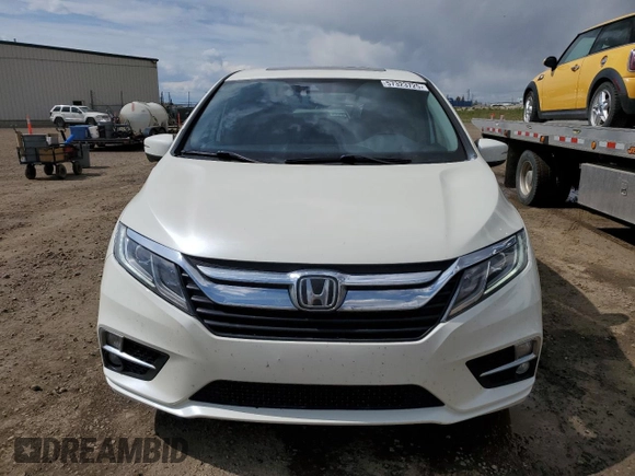 2018 Honda Odyssey EX-L z VIN 5FNRL6H68JB508942, wystawiony jako Copart lot #57323725 z przebiegiem 106 083 mil mil oraz Czysty tytuł • Clean title. Historia ofert i sprzedaży dostępna na DreamBid. Obrazek 5.
