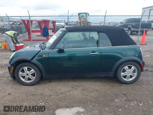 2005 MINI Convertible with VIN WMWRF33495TG11818, listed as a IAAI auction lot 42351446 with 100,033 mi miles and . Bid and sale history available at DreamBid. Image 14.