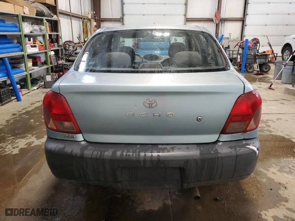 2000 Toyota ECHO with VIN JTDBT1235Y0070084, listed as a Copart auction lot 42984115 with NaN miles and Salvage Title. Bid and sale history available at carsss.com. Image 6.