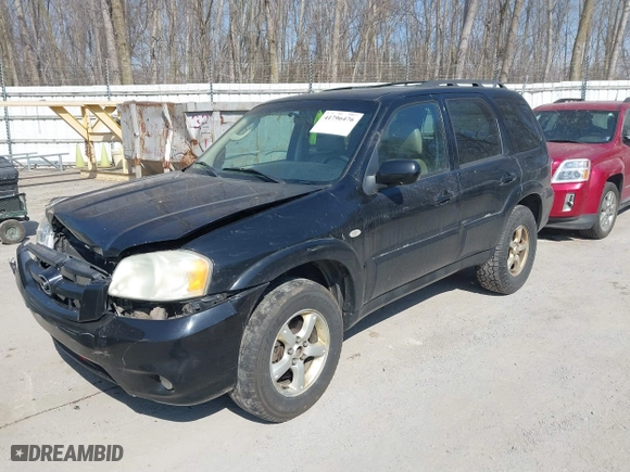 2005 Mazda Tribute s with VIN 4F2YZ06165KM39949, listed as a IAAI auction lot 41796476 with 270,492 mi miles. Bid and sale history available at carsss.com. Image 17.