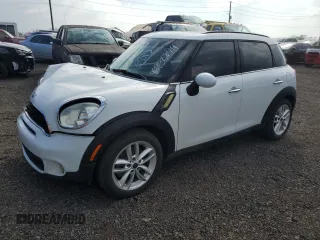2011 MINI Countryman S z VIN WMWZC3C52BWL78664, wystawiony jako Copart lot #86932844 z przebiegiem 110 437 mil mil oraz Szkoda całkowita • Salvage title. Historia ofert i sprzedaży dostępna na DreamBid. Obrazek 1.