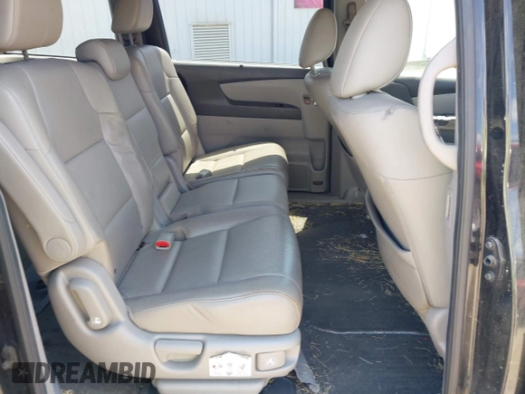 2014 Honda Odyssey EX-L with VIN 5FNRL5H66EB062158, listed as a IAAI auction lot 42072020 with 211,278 mi miles and . Bid and sale history available at carsss.com. Image 8.