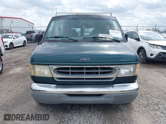 1999 Ford Econoline Cargo with VIN 1FDRE14W4XHC30466, listed as a IAAI auction lot 41935293 with 276,092 mi miles. Bid and sale history available at carsss.com. Image 6.