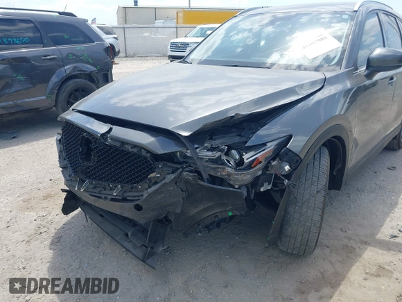 2017 Mazda CX-5 Grand Touring with VIN JM3KFADL3H0227655, listed as a IAAI auction lot 41897981 with 103,545 mi miles. Bid and sale history available at carsss.com. Image 6.