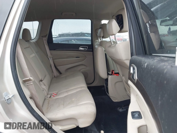 2014 Jeep Grand Cherokee Laredo with VIN 1C4RJEAG5EC424244, listed as a IAAI auction lot 41608821 with 156,251 mi miles and . Bid and sale history available at DreamBid. Image 8.